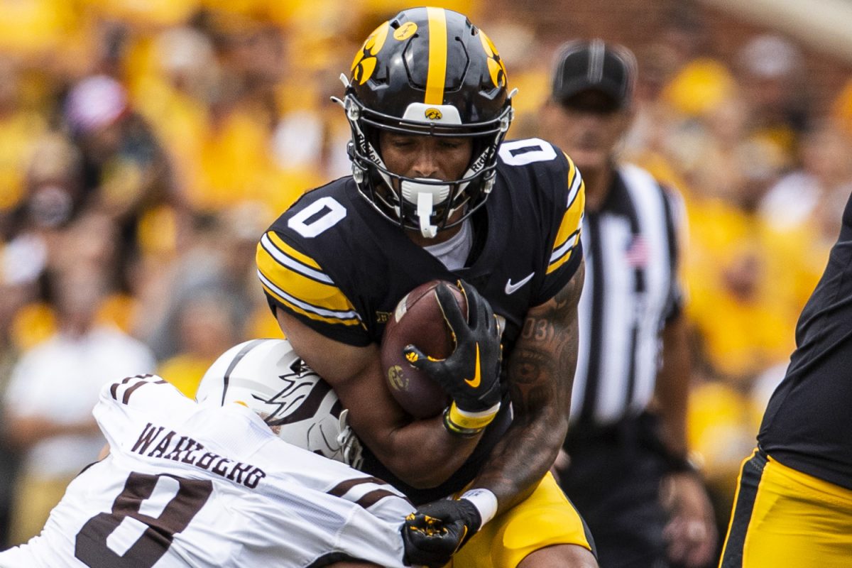 Iowa wide receiver Diante Vines runs the ball during a football game between Iowa and Western Michigan at Kinnick Stadium in Iowa City on Saturday, Sept. 16, 2023. The Hawkeyes defeated the Broncos, 41-10. Vines had 7 receiving yards and one touchdown.