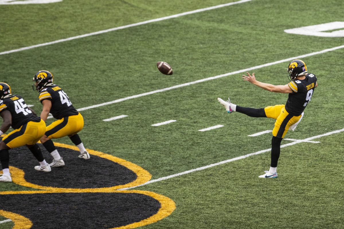 Iowa punter Tory Taylor punts the ball during a football game between Iowa and Western Michigan at Kinnick Stadium in Iowa City on Saturday, Sept. 16, 2023. The Hawkeyes defeated the Broncos, 41-10. Taylor punted the ball for 167 yards.