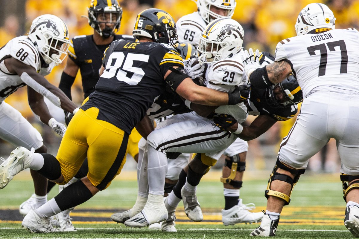 Western+Michigan+running+back+Jalen+Buckley+gets+stopped+by+defensive+lineman+Logan+Lee+during+a+football+game+between+Iowa+and+Western+Michigan+at+Kinnick+Stadium+in+Iowa+City+on+Saturday%2C+Sept.+16%2C+2023.+The+Hawkeyes+defeated+the+Broncos%2C+41-10.+Buckley+averaged+2.1+yards+per+carry.