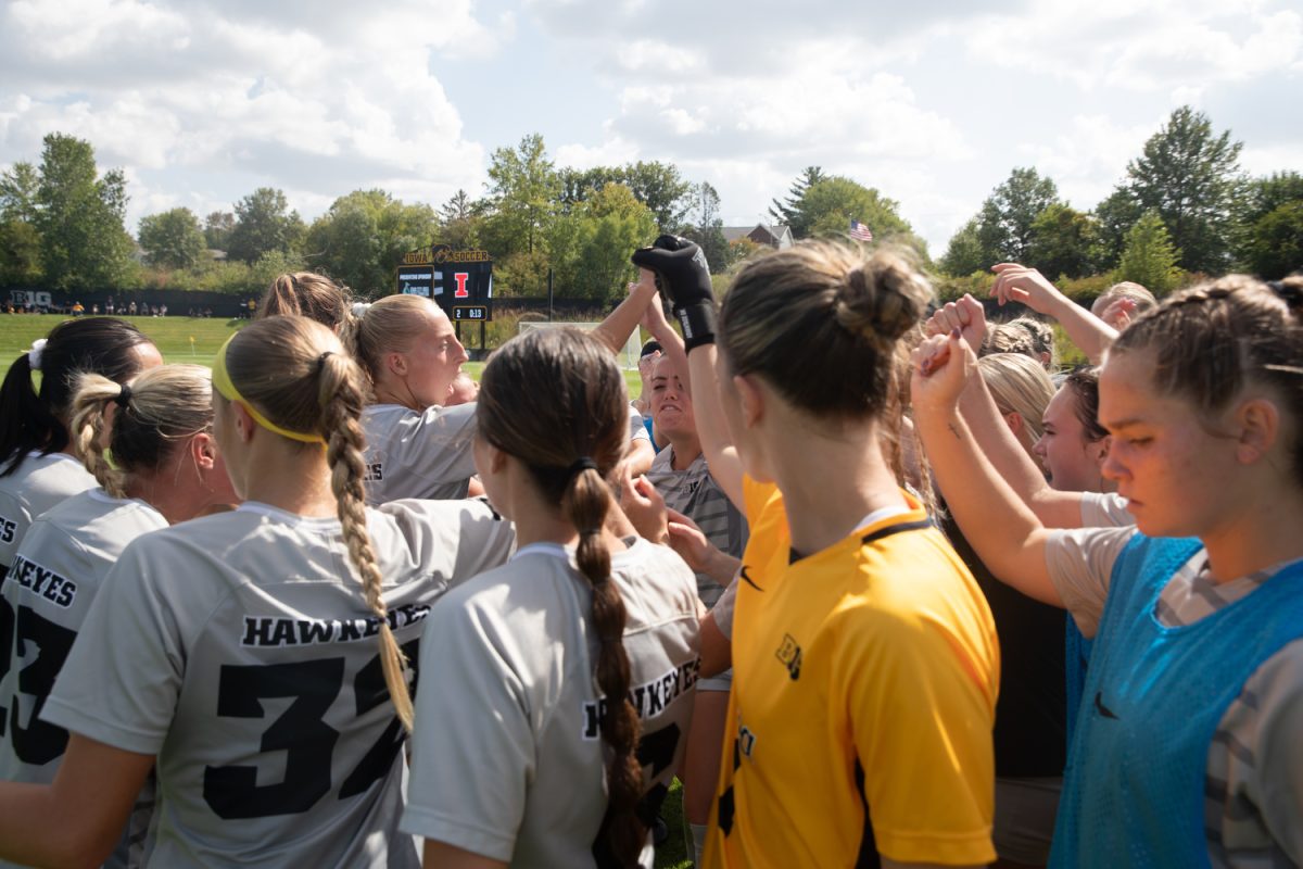 Iowa Soccer players huddle during a soccer game between Iowa and Illinois at the University of Iowa Soccer Complex in Iowa City on Sunday, Sept. 17, 2023. Sunday’s game marked Iowa’s Big 10 home opener. The Hawkeyes and the Fighting Illini tied 1-1.