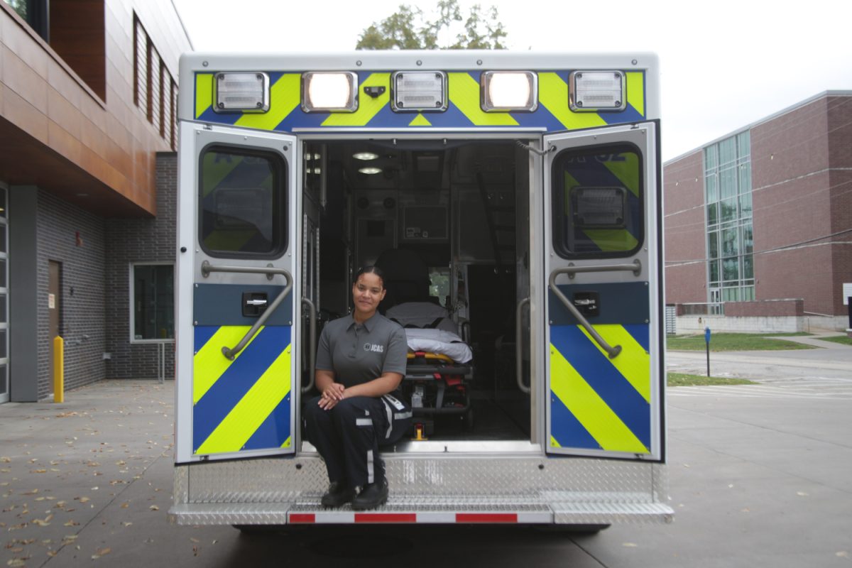 EMT+apprentice+Imonie+Eicher+poses+for+a+portrait+in+a+Johnson+County+Ambulance+at+the+Johnson+County+Ambulance+Facility+in+Iowa+City+on+Thursday%2C+Sept.+21%2C+2023.+