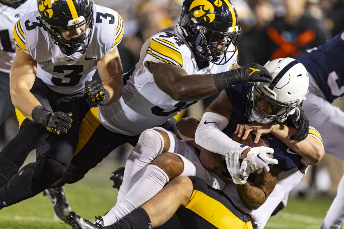 Iowa+linebacker+Jay+Higgins+tackles+Penn+State+wide+receiver+Kaden+Saunders+during+a+football+game+between+No.+24+Iowa+and+No.+7+Penn+State+at+Beaver+Stadium+in+State+College%2C+Pa.%2C+on+Saturday%2C+Sept.+23%2C+2023.+