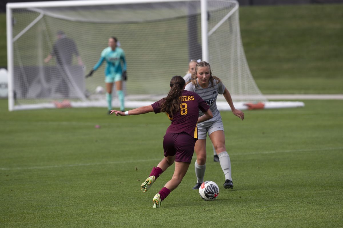 Minnesota midfielder Sophia Romine navigates around Iowa players during a soccer game between Iowa and Minnesota at the University of Iowa Soccer Complex in Iowa City on Sunday, Sept. 24, 2023. The Hawkeyes tied the Golden Gophers 0-0. 