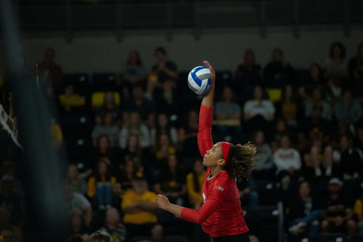 No. 7 Chelsea Thorpe swings at the ball on Sept. 24, 2023 at the Xtreme arena in Coralville. The Buckeyes defeated the Hawkeyes 3-0 .