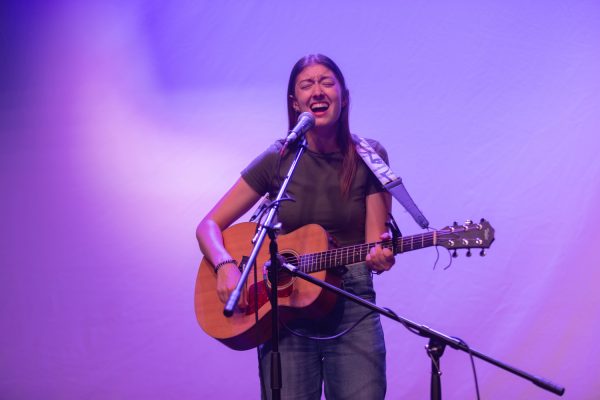 Eva Marie performs an original song during an Iowa City Songwriters Collective performance at The James Theater on Wednesday, Sept. 27, 2023. 