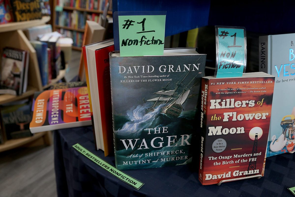 David Grann’s book, Killers of the Flower Moon, has been adapted for the big screen and is directed by Martin Scorsese. This and his other book, The Wager, are for sale at Storybook Cove in Hanover on Wednesday, Aug. 9, 2023. Janet Bibeau has owned Storybook Cove since 1990.