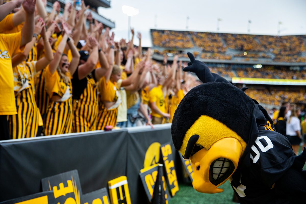 Herky interacts with the student section during a football game between Iowa and Western Michigan at Kinnick Stadium in Iowa City on Saturday, Sept. 16, 2023. Herky celebrated his 75th birthday during halftime.