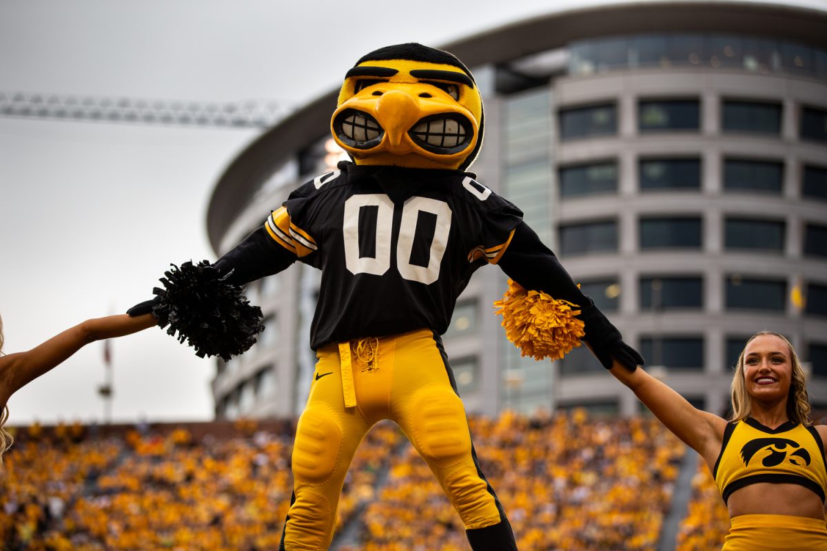 Herky is lifted up by the spirit squad during a football game between Iowa and Western Michigan at Kinnick Stadium in Iowa City on Saturday, Sept. 16, 2023. Herky celebrated his 75th birthday during halftime.