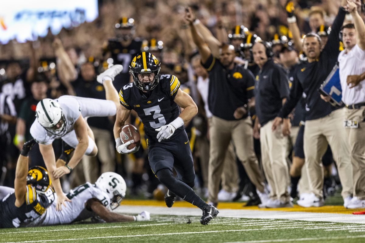 Iowa+defensive+back+Cooper+DeJean+runs+toward+the+end+zone+for+a+touchdown+after+a+punt+return+during+a+football+game+between+Iowa+and+Michigan+State+at+Kinnick+Stadium+in+Iowa+City+on+Saturday%2C+Sept.+30%2C+2023.+The+Hawkeyes+defeated+the+Spartans%2C+26-16.+DeJean%E2%80%99s+touchdown+on+the+punt+return+was+70+yards.