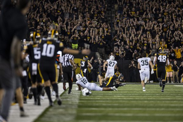 Iowa defensive back Cooper DeJean returns a punt for a touchdown during a football game between Iowa and Michigan State at Kinnick Stadium on Saturday, Sept. 30, 2023. The Hawkeyes defeated the Spartans, 26-16. DeJean’s touchdown on the punt return was 70 yards.