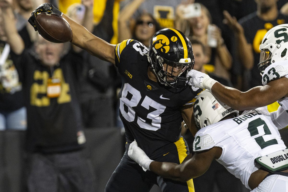 Iowa+tight+end+Erick+All+lunges+forward+to+score+a+touchdown+during+a+football+game+between+Iowa+and+Michigan+State+at+Kinnick+Stadium+on+Saturday%2C+Sept.+30%2C+2023.+The+Hawkeyes+defeated+the+Spartans%2C+26-16.+