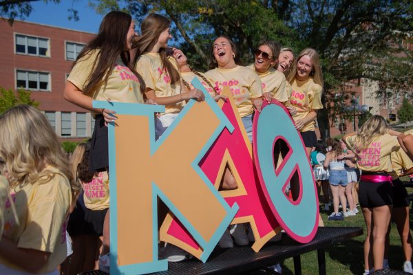Kappa Alpha Theta poses for a photo at the University of Iowa’s Bid Day in Hubbard Park in Iowa City on Sunday, Oct. 1, 2023. The potential new members accepted their bids.