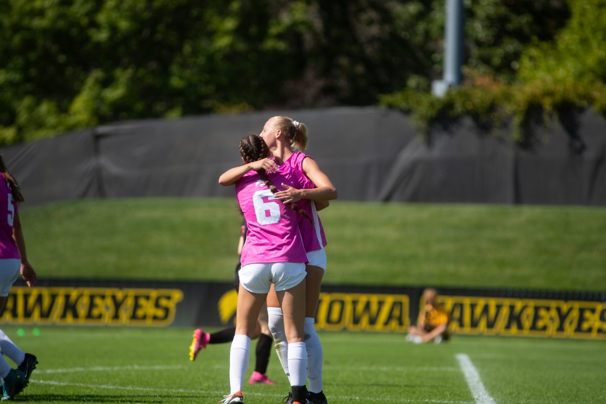 Iowa midfielder Rile Fetty celebrates with her teammate after her goal during a women's soccer game between Iowa and Rutgers at the Iowa Soccer Complex in Iowa City on Oct. 1, 2023.