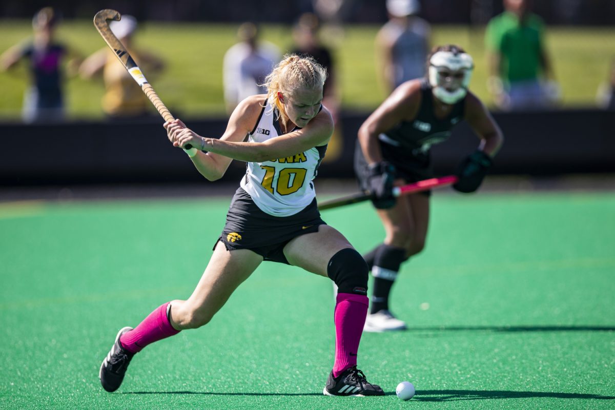 Iowa midfielder Dionne van Aalsum attempts a goal up the field during a field hockey match between No. 1 Iowa and Michigan State at Grand Field in Iowa City on Sunday, Oct. 1, 2023. Van Aalsum played for 51 minutes. The Hawkeyes defeated the Spartans, 3-1. 