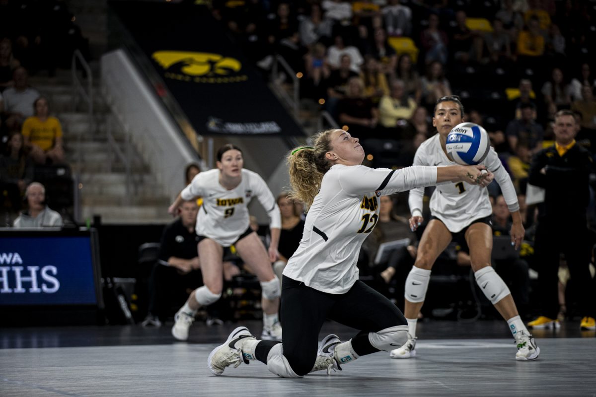 Iowa’s Bailey Ortega dug the ball during a volleyball match between Iowa and Wisconsin at Xtreme Arena in Coralville on Oct. 4, 2023. The Badgers defeated the Hawkeyes, 3-0.