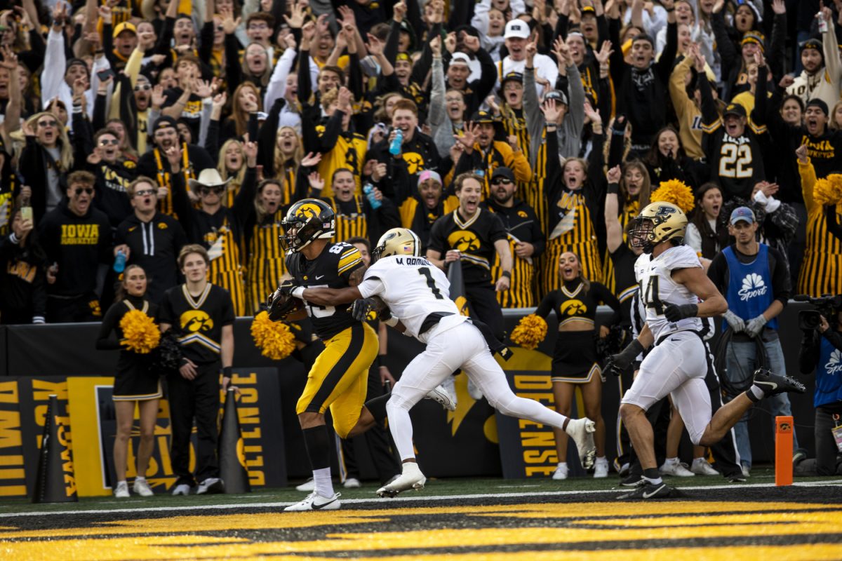 Iowa tight end Erick All scores a touchdown during the Iowa homecoming football game between Iowa and Purdue at Kinnick Stadium in Iowa City on Saturday, Oct. 7, 2023. The Hawkeyes defeated the Boilermakers 20-14.