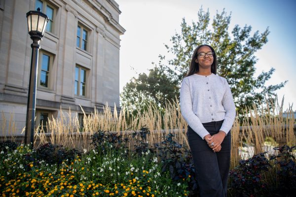 Noora Minalla poses for a portrait on the Pentacrest in Iowa City on Monday, Oct. 9, 2023. 