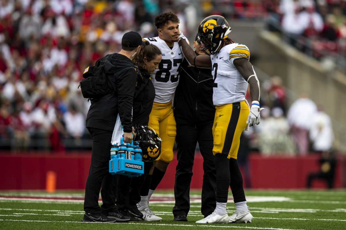 Iowa tight end Erick All walks off the field after an injury during a football game between Iowa and Wisconsin on Saturday, Oct. 14, 2023. (Cody Blissett/The Daily Iowan)