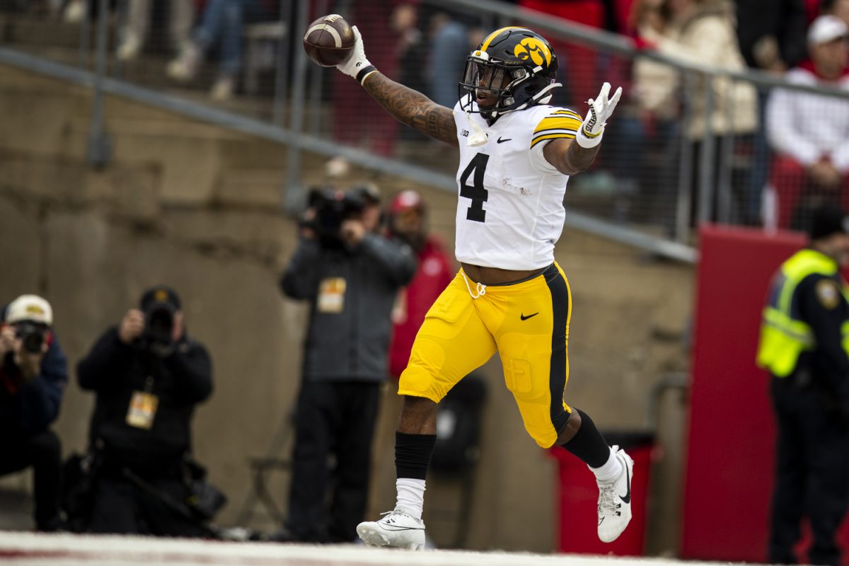 Iowa+running+back+Leshon+Williams+celebrates+in+the+end+zone+after+a+rushing+touchdown+during+a+football+game+between+Iowa+and+Wisconsin+on+Saturday%2C+Oct.+14%2C+2023.+%28Cody+Blissett%2FThe+Daily+Iowan%29