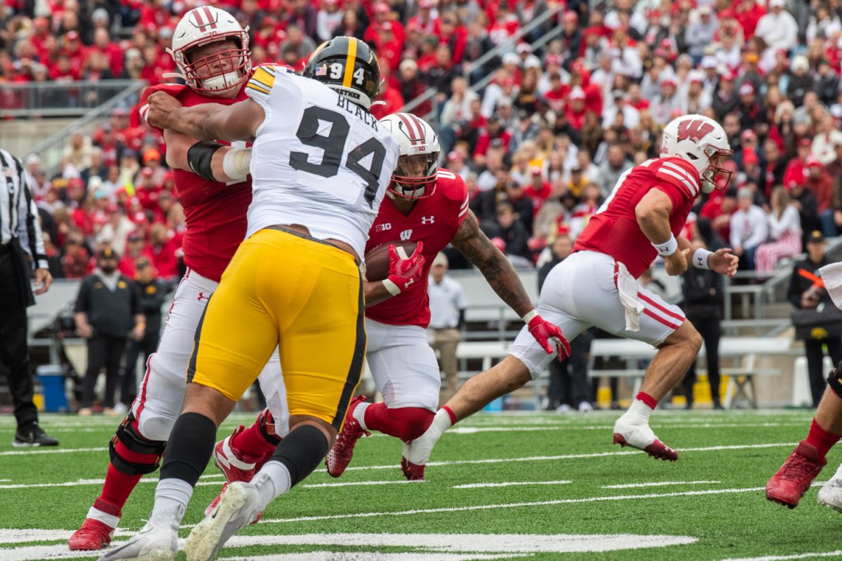 Wisconsin+running+back+Braelon+Allen+carries+the+ball+down+the+field+during+a+football+game+between+Iowa+and+Wisconsin+at+Camp+Randall+Stadium+in+Madison%2C+Wisconsin+on+Saturday%2C+Oct.+14%2C+2023.+The+Hawkeyes+defeated+the+Badgers+15-6.+Allen+totaled+103+yards+agains+Iowa.