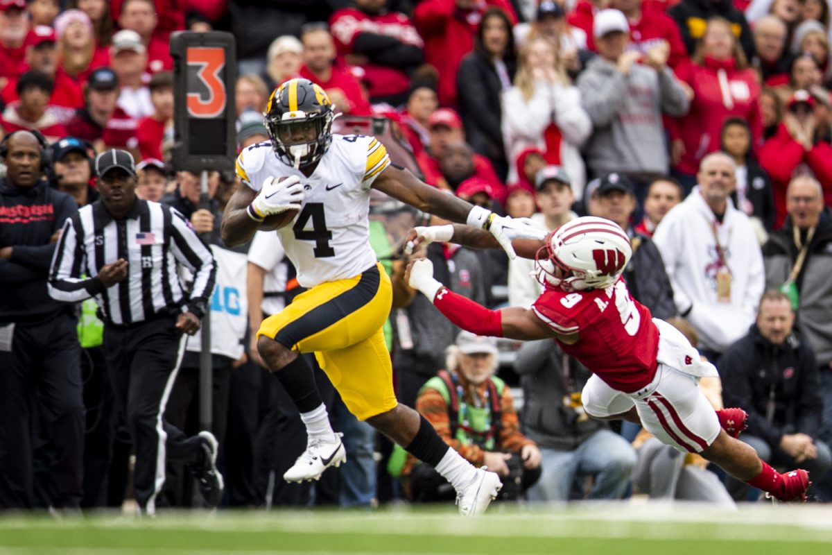 Iowa running back Leshon Williams breaks a tackle and rushes for a touchdown during a football game between Iowa and Wisconsin at Camp Randall Stadium on Saturday, Oct. 14, 2023. Williams rushed for 174 yards. The Hawkeyes defeated the Badgers, 15-6.