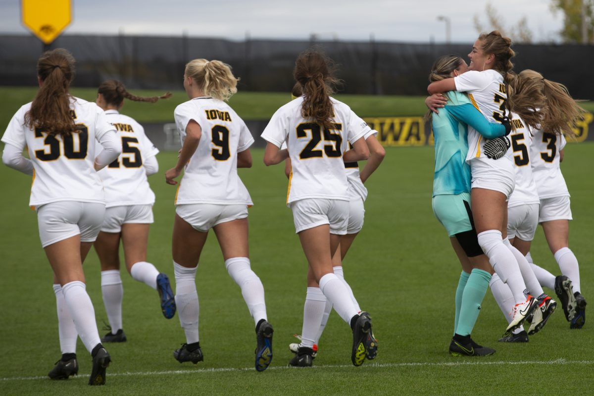 Iowa players celebrate during a soccer match between Iowa and Maryland at the Soccer Complex in Iowa City on Sunday, Oct. 15, 2023. The Hawkeyes defeat the Terrapins, 5-0.