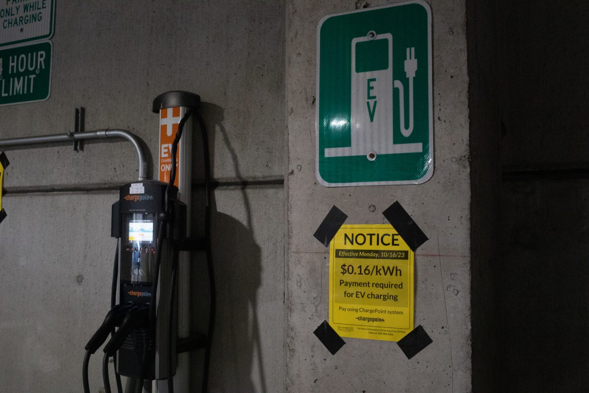 An electric vehicle charging station is seen in the Dubuque Street Ramp in Iowa City on Tuesday, Oct. 17, 2023.