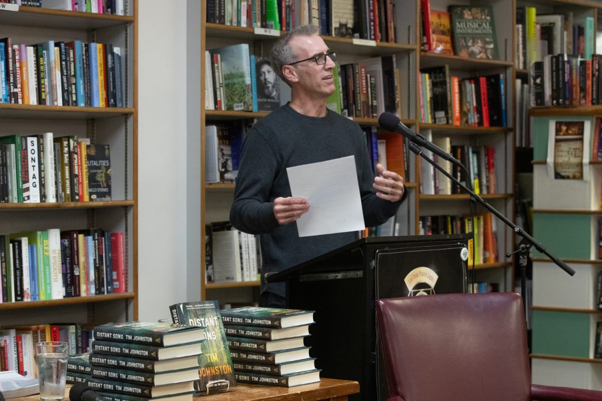 Tim Johnston speaks during a conversation with Blaine Greteman at Prairie Lights Books in Iowa City on Tuesday Oct. 17, 2023. 