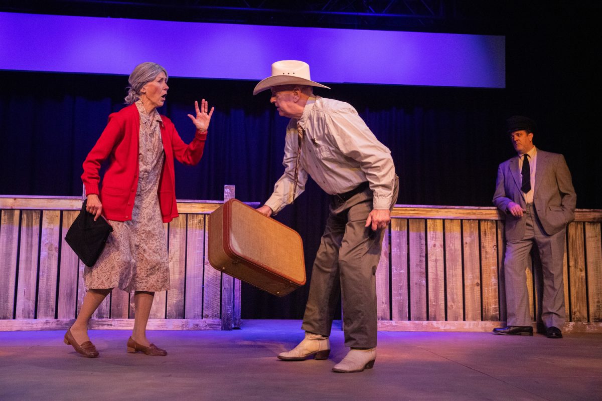 Jody Hovland, playing Mrs. Watts, and Phil Jordan, an ensemble member, perform during a production of “Trip to Bountiful” at Riverside Theater in Iowa City on Friday, Oct. 20, 2023.