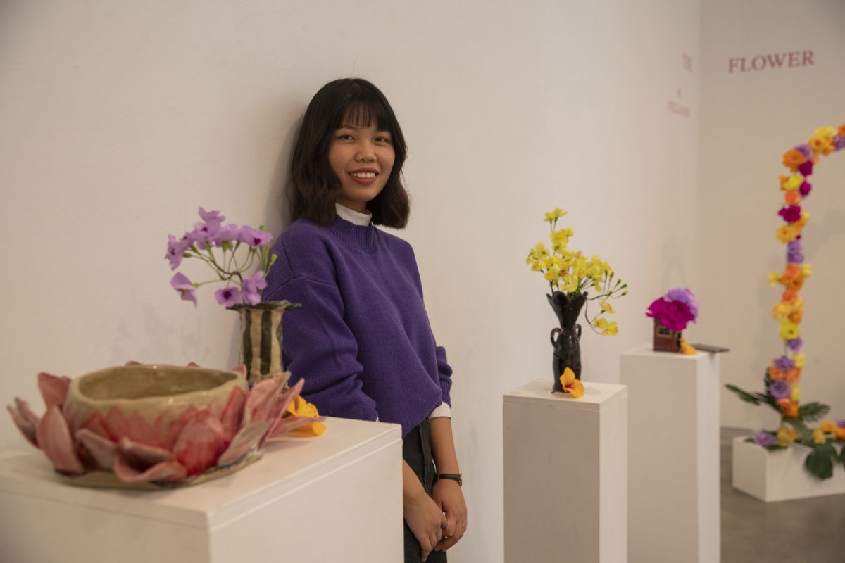 University of Iowa student Stella Deo poses for a portrait in her art exhibition titled “The Flower at the Visual Arts Building in Iowa City on Tuesday, Oct. 19, 2023.