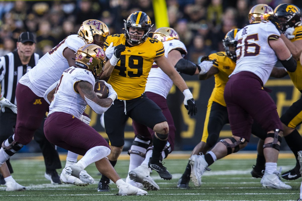 Minnesota running back Darius Taylor carries the ball down the field during a football game between No. 24 Iowa and Minnesota at Kinnick Stadium in Iowa City on Saturday, Oct. 21, 2023. Taylor totaled 59 yards rushing and 25 yards receiving. The Golden Gophers defeated the Hawkeyes 12-10.