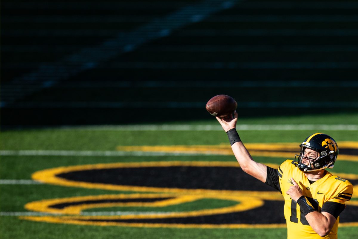 Iowa quarterback Deacon Hill throws the ball during a football game between No. 24 Iowa and Minnesota at Kinnick Stadium in Iowa City on Saturday, Oct. 21, 2023. Hill had 116 passing yards. The Golden Gophers defeated the Hawkeyes, 12-10.
