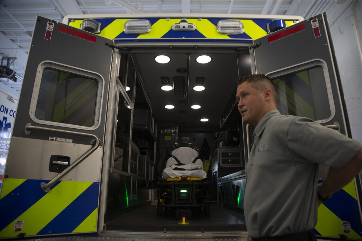 Johnson County Ambulance Service Assistant Director Ben Symonds showcases an ambulance at the Johnson County Ambulance Medical Examiner Building on Wednesday, Sept. 27, 2023. The Johnson County Ambulance Service works with the University of Iowa Hospitals and Clinics on game day to manage the influx of people and emergencies in and around Kinnick. “We also have 18 different additional EMS staff that we use to kind of help take care of everything that’s going on inside the game,” Symonds said. 