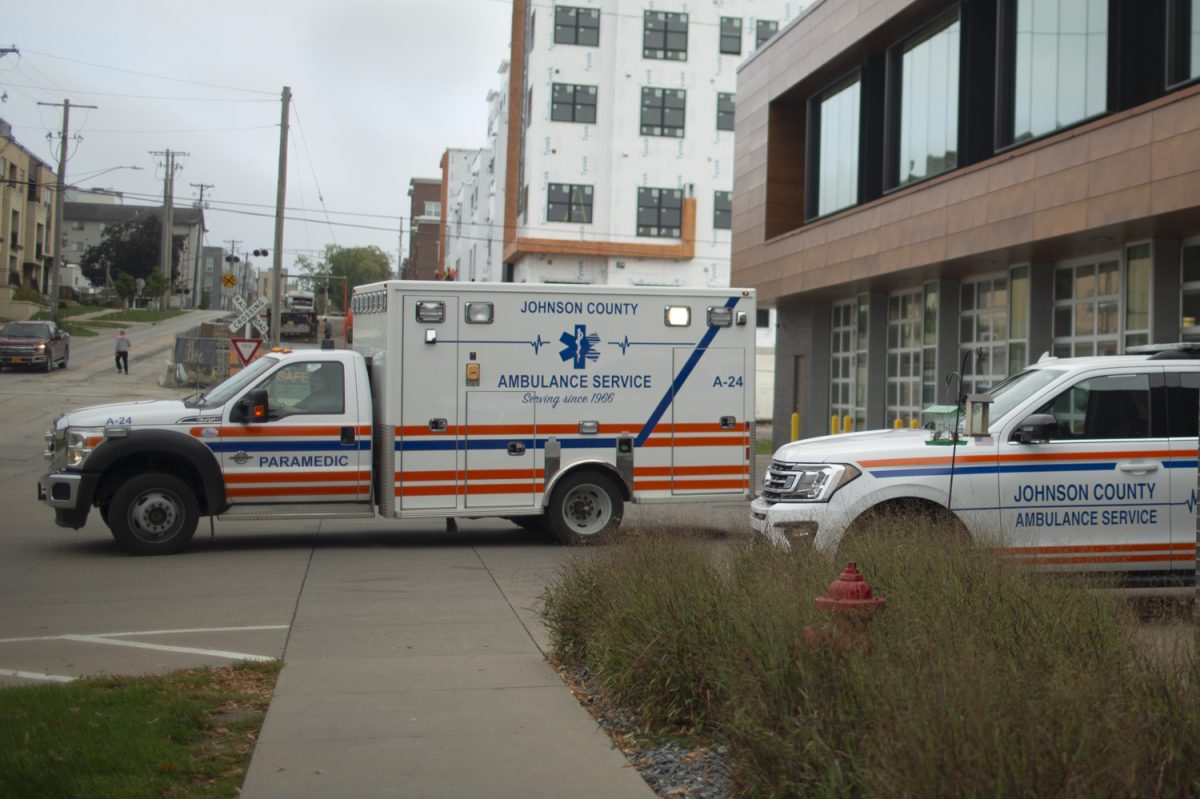 An EMS worker drives an ambulance at the Johnson County Ambulance Medical Examiner Building on Wednesday, Sept. 27, 2023. 