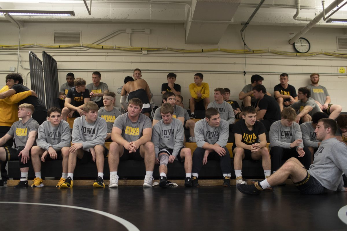 The+Iowa+mens+wrestling+team+sit+on+the+bleachers+during+the+Iowa+mens+wrestling+media+day+at+Carver-Hawkeye+Arena+on+Thursday%2C+Oct.+26%2C+2023.