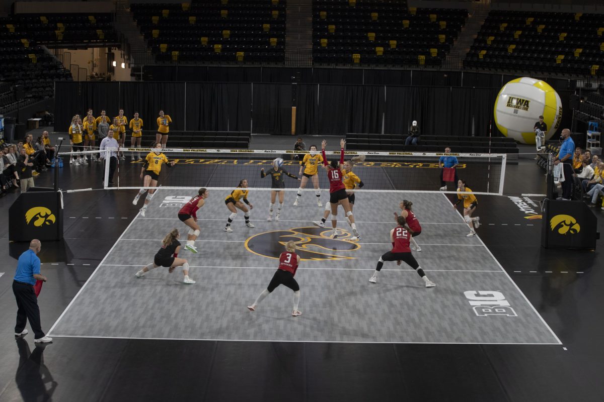 The Scarlet Knights and Hawkeyes compete during a volleyball match between Iowa and Rutgers at Xtream Arena on Friday Oct. 27, 2023. The Scarlet Knights defeated the Hawkeyes, 3-2.