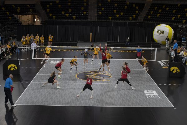 The Scarlet Knights and Hawkeyes compete during a volleyball match between Iowa and Rutgers at Xtream Arena on Friday Oct. 27, 2023. The Scarlet Knights defeated the Hawkeyes, 3-2.