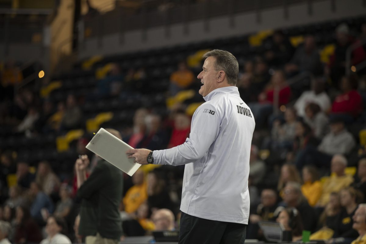Iowa head coach Jim Barnes yells during a volleyball match between Iowa and Rutgers at Xtream Arena on Friday Oct. 27, 2023. The Scarlet Knights defeated the Hawkeyes, 3-2. In his first season in 2021, Barnes led Iowa to their best season since 2019.