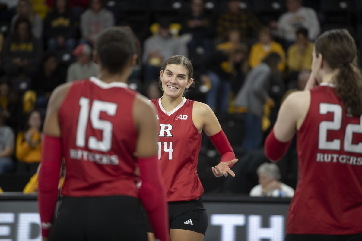 Rutgers outside hitter Anna Hartman shrugs after winning a point during a volleyball match between Iowa and Rutgers at Xtream Arena on Friday Oct. 27, 2023. The Scarlet Knights defeated the Hawkeyes, 3-2.
