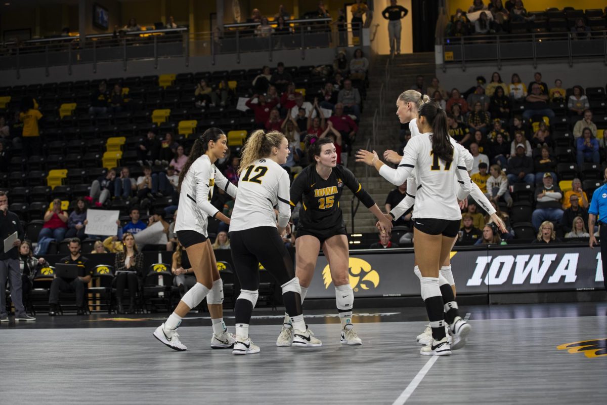 The Iowa volleyball team comes together to talk strategy during a volleyball match between Maryland and Iowa at Xtream Arena in Coralville on Oct. 28, 2023. The Terrapins defeated the Hawkeyes, 3-0. 