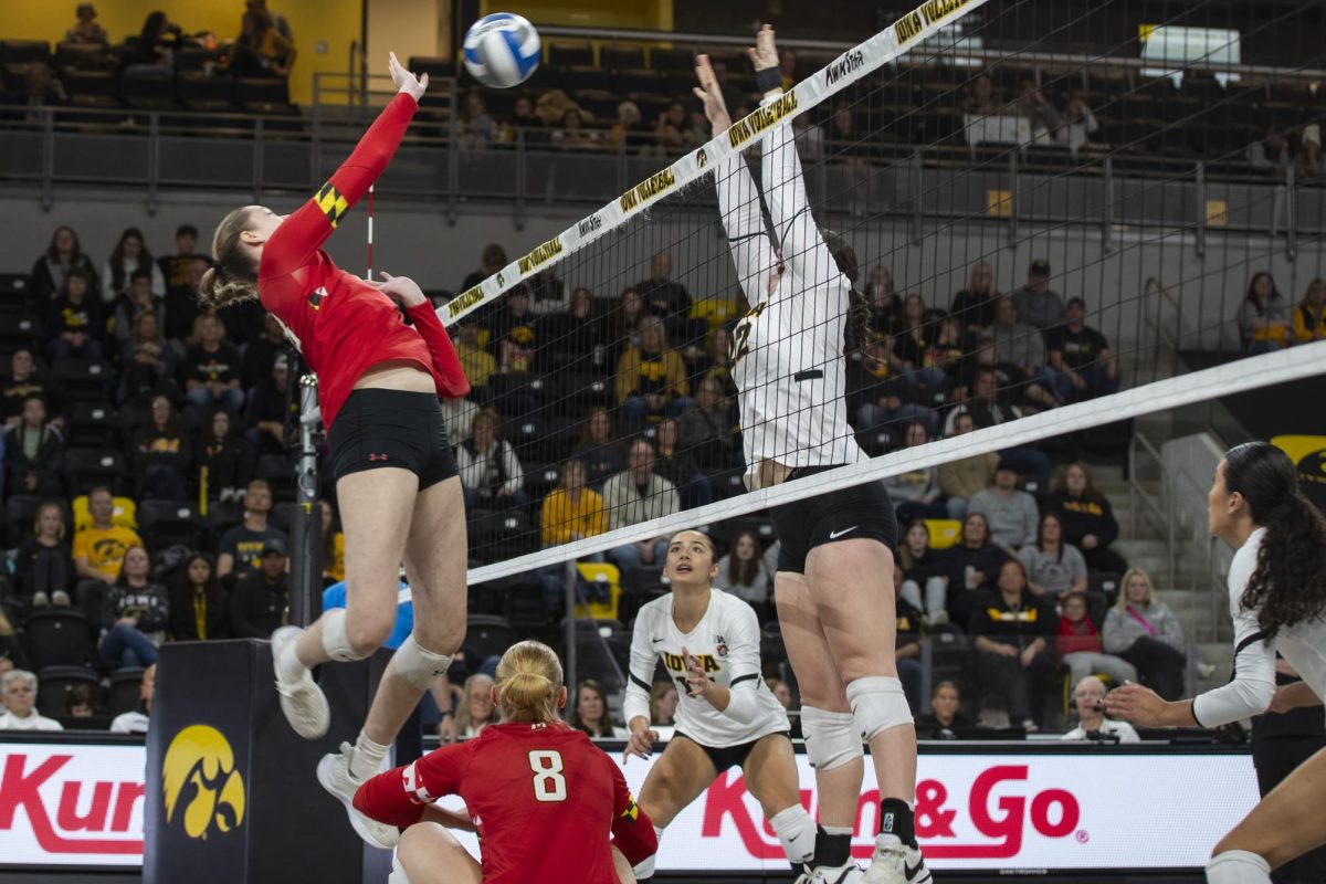 Marylands Anastasia Russ swings at the ball during a volleyball match between Maryland and Iowa at Xtream Arena in Coralville on Oct. 28, 2023. The Terrapins defeated the Hawkeyes 3-0.