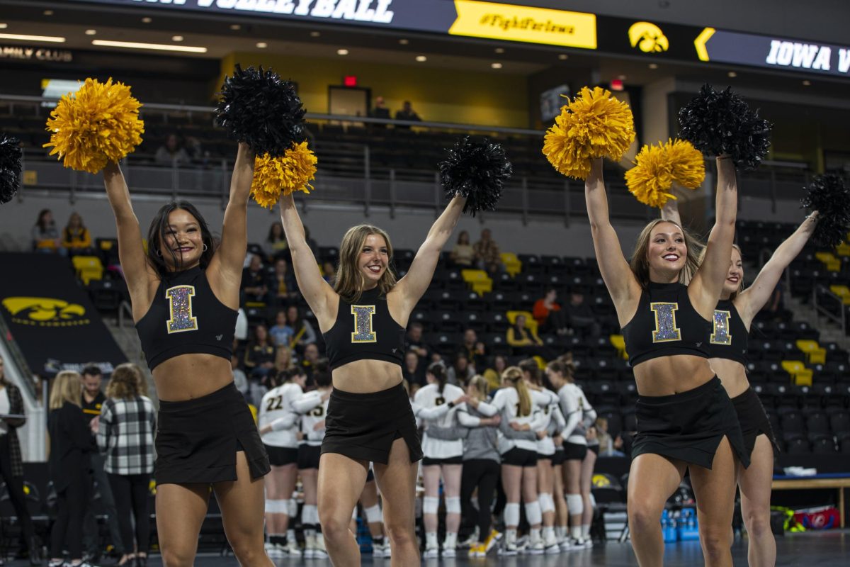The Iowa Spirit Squad perform during a volleyball match between Maryland  and  Iowa at Xtream Arena in Coralville on Oct. 28, 2023. The Terrapins defeated the Hawkeyes 3-0. 