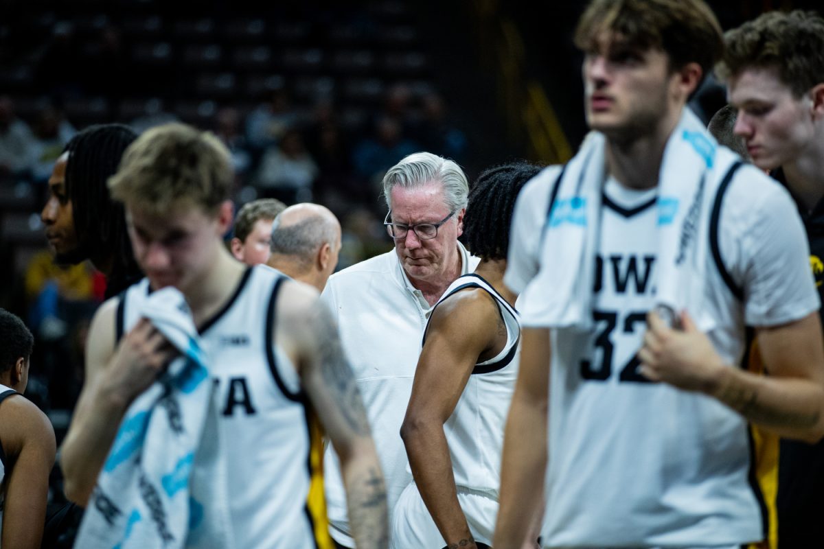 Iowa head coach Fran McCaffery interacts with players during a men’s basketball game between Iowa and Quincy at Carver-Hawkeye Arena in Iowa City on Monday, Oct. 30, 2023. The Hawkeyes defeated the Hawks, 103-76.