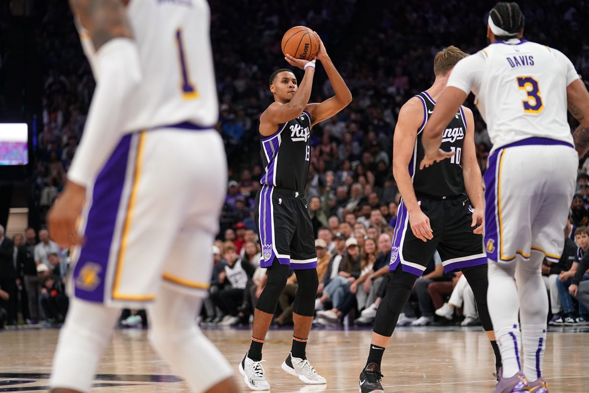 Oct 29, 2023; Sacramento, California, USA; Sacramento Kings forward Keegan Murray (13) makes a three-point basket against the Los Angeles Lakers in the fourth quarter at the Golden 1 Center. Mandatory Credit: Cary Edmondson-USA TODAY Sports