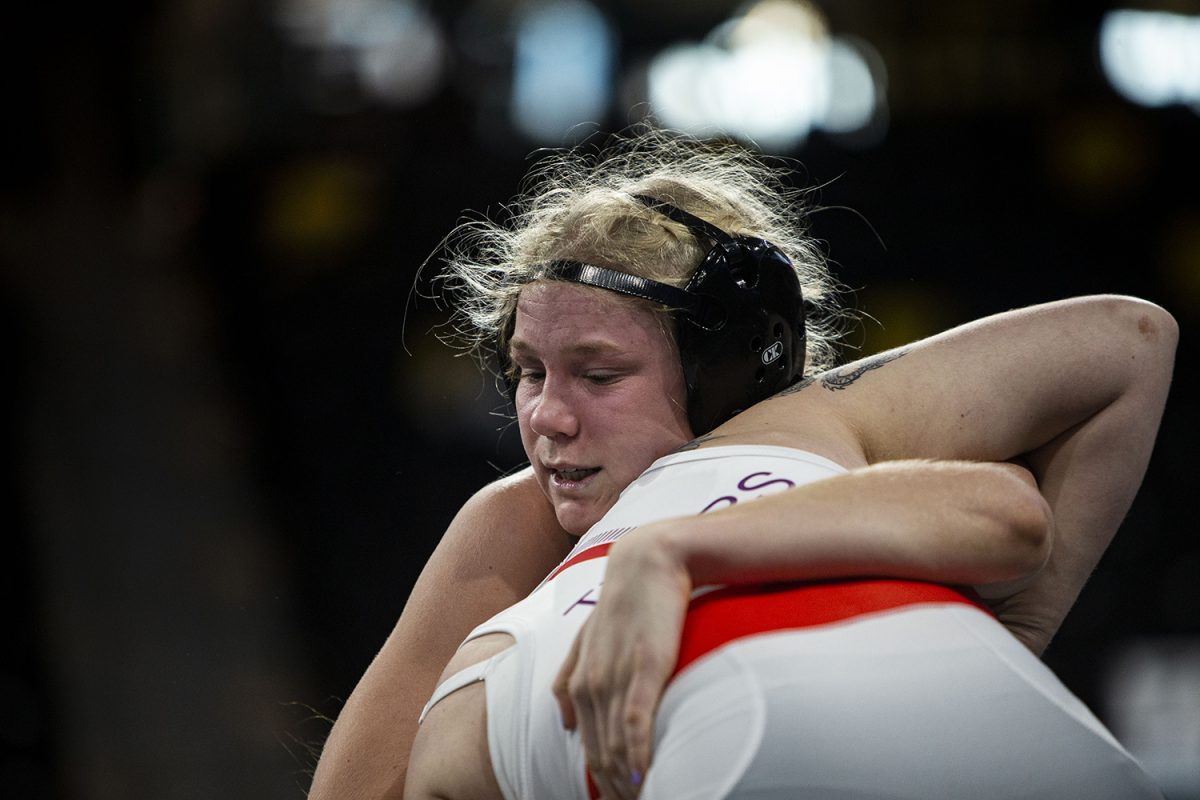 Iowa’s unattached 143-pound Ella Schmit wrestles Iowa Wesleyan’s Isabelle Hawley during day two of the 2022 Soldier Salute College Wrestling Tournament at Xtream Arena in Coralville, Iowa on Friday, Dec. 30, 2022. Schmit defeated Hawley by fall, 1:44. 
