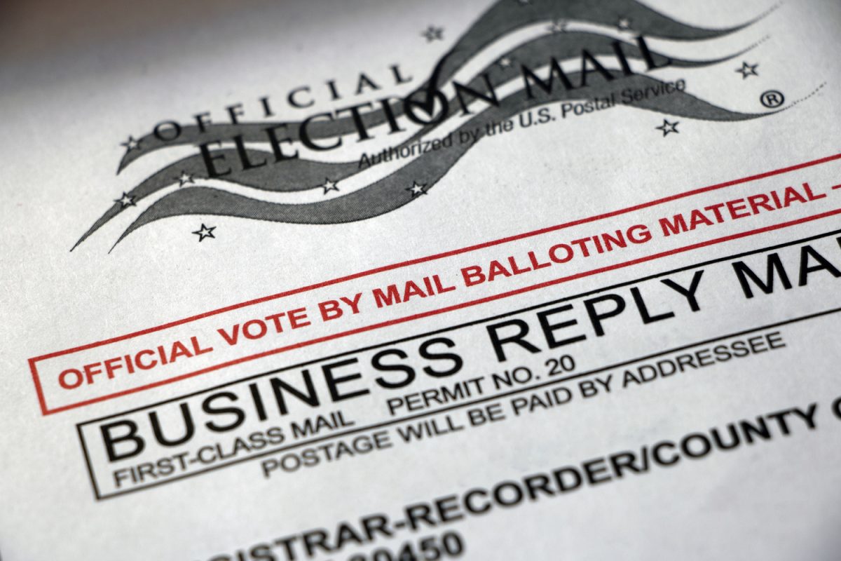 Closeup of a Vote by Mail envelope, official balloting material - business reply mail, USPS first class mail.