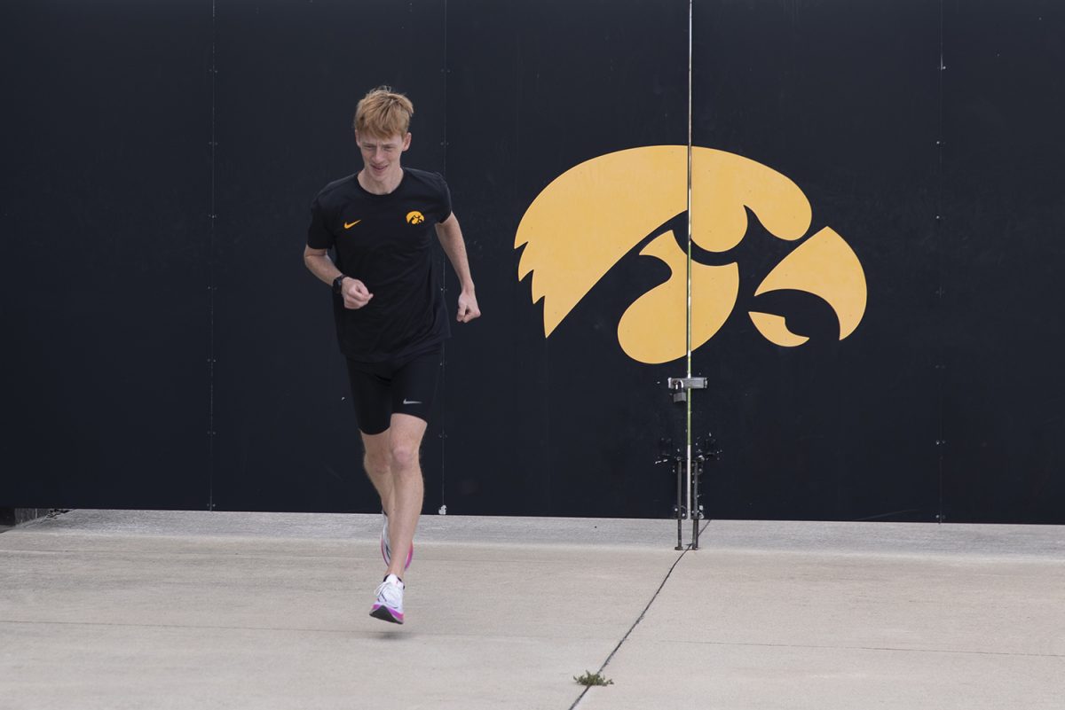 Iowa%E2%80%99s+Brayden+Burnett+warms+up+during+a+practice+outside+the+Hawkeye+Indoor+Track+Facility+in+Iowa+City+on+Thursday%2C+Nov.+2%2C+2023.