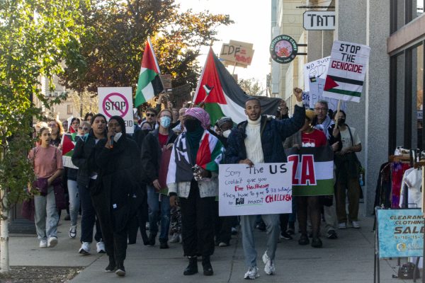 Event organizers lead a march following a protest supporting to end the occupation of Palestine in Downtown Iowa City on Saturday, Nov. 4, 2023. (Sahithi Shankaiahgari/The Daily Iowan)