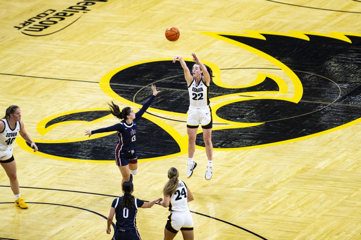 Iowa guard Caitlin Clark shoots a 3-pointer during a home opener basketball game between No. 3 Iowa and Fairleigh Dickinson at Carver-Hawkeye Arena on Monday, Nov. 6, 2023. Clark shot 4-of-9 in 3-pointers. The Hawkeyes, defeated the Knights, 102-46.