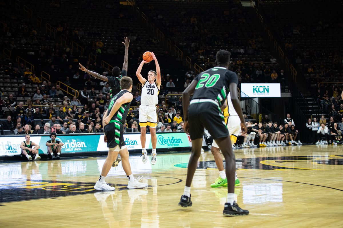 Iowa forward Payton Sandfort shoots the ball during the basketball game between Iowa Hawkeyes and North Dakota Fighting Hawks at Carver-Hawkeye Arena in Iowa City on Tuesday, Nov. 7, 2023. The Hawkeyes defeated the Fighting Hawks 110-68.